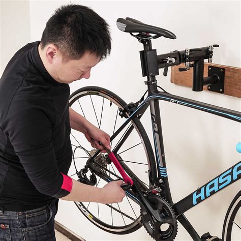 Makes repairs easy and simple task. Bike Repair Stand - Wall Mount Bicycle Mechanics Home ...