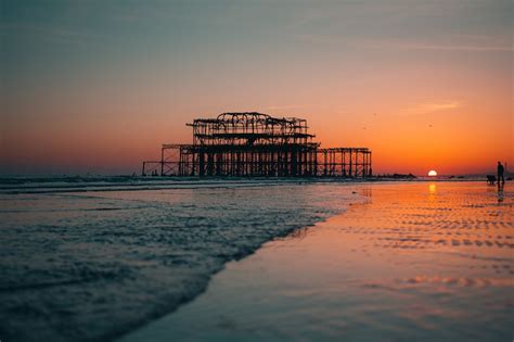 Silhouette Of Brighton West Pier On Sea During Sunset · Free Stock Photo
