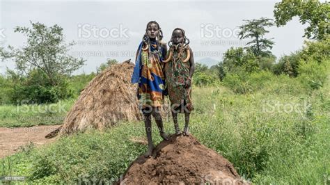 Two Mursi Tribe Girls From Ethiopia The Women Of The Mursi Tribe Have A