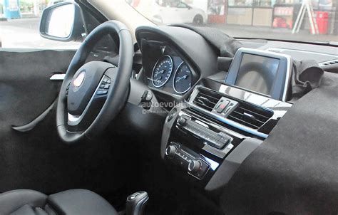 The interior has a smart look, with seat design that would be at home in a much more expensive car. 2016 BMW X1 Interior Revealed in Spy Photos - autoevolution