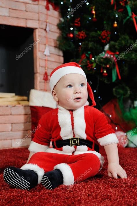 Baby Boy Dressed As Santa Claus Boy In A Santa Suit On The Back