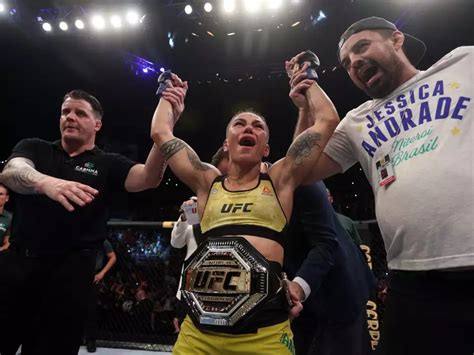 A Female Ufc Star Celebrated Her Latest Championship Win By Posing