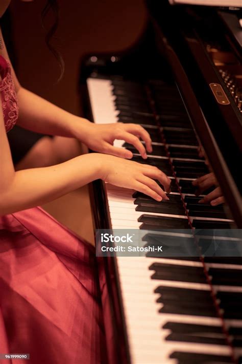 Young Woman Playing Piano In Concert Stock Photo Download Image Now