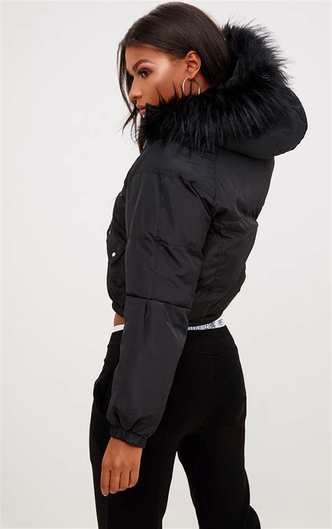 black cropped puffer jacket with faux fur hood coats and jackets prettylittlething ie