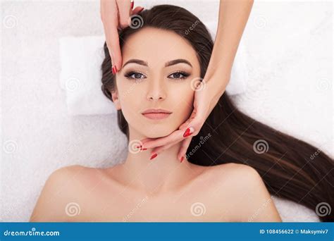 Facial Beauty Treatment Closeup Of Beautiful Woman Getting Beau Stock