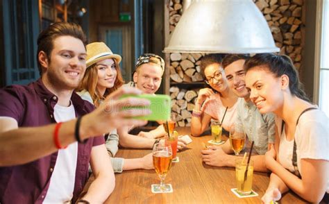 Happy Friends With Smartphone Taking Selfie At Bar Stock Image Image Of Girls Latin 60364805