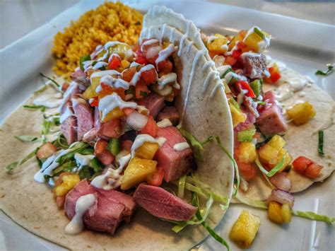 These ahi fish tacos have a perfect combination of savory and sweet and they are also very nutritionally balanced with an even ratio of carbohydrates from the tortilla shells and salsa, protein from the ahi tuna, and healthy fats from the avocado. Homemade ahi tuna tacos and pineapple fresca : food
