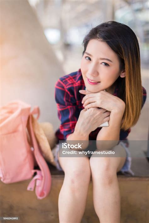 Beautiful Happiness Young Asian Girl In Casual Dress Traveling Alone At Train Station Or Airport