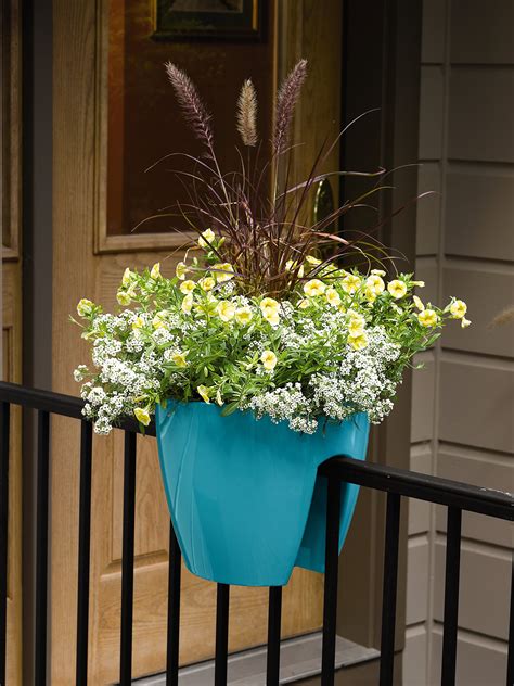 Gone are those days, when people had backyards full of a lush garden and open space. Railing Planters: Self-Watering Saddle Planter | Gardeners.com