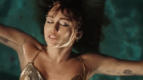 Slide Away Gif By Miley Cyrus Find Share On Giphy