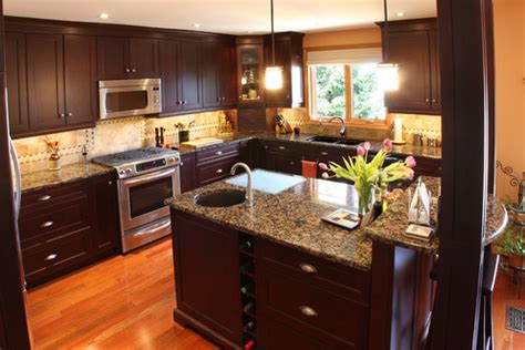 Modern kitchen with brown granite countertops. Baltic Brown Granite | Granite Countertops |Granite Tile