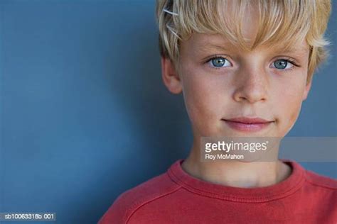 Boy On Blue Background Photos And Premium High Res Pictures Getty Images