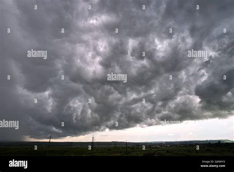 Landscape Of Dark Ominous Clouds Forming On Stormy Sky During Heavy