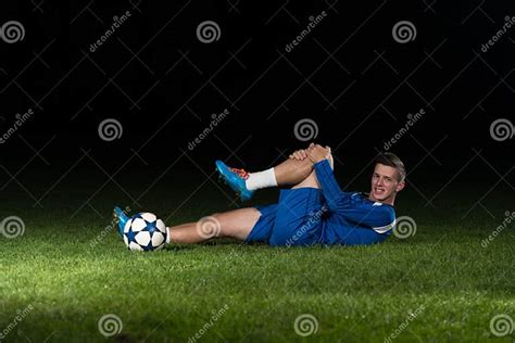Injured Football Player Lying On The Ground Stock Image Image Of