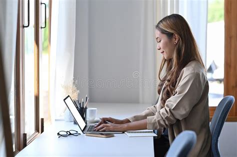 Beautiful Woman Entrepreneur Working With Computer Laptop Stock Image