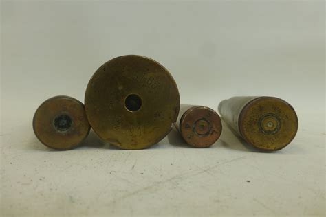 Three Complete Wwii Dated Inert Cannon Shells And A Complete Wwi