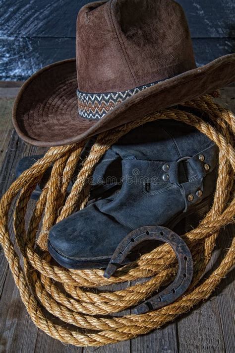 American West Rodeo Cowboy Hat On Lasso With Boots Stock Image Image