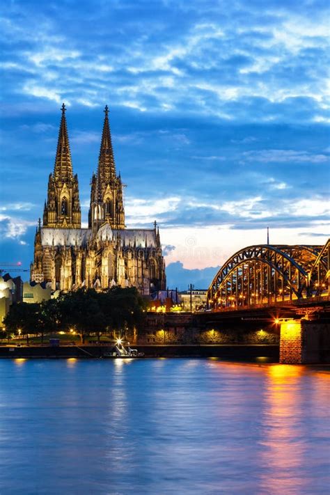 Cologne Cathedral City Skyline And Hohenzollern Bridge With Rhine River