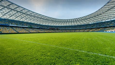 Panoramic View Of Soccer Field Stadium And Stadium Seats Windows