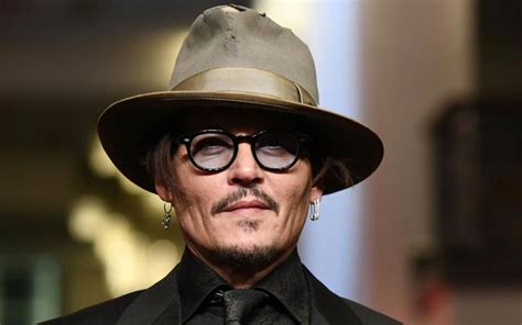 John christopher johnny depp ii (born june 9, 1963) is an american actor, film producer, and musician. Johnny Depp Knows The Sartorial Secret To Always Looking Slick