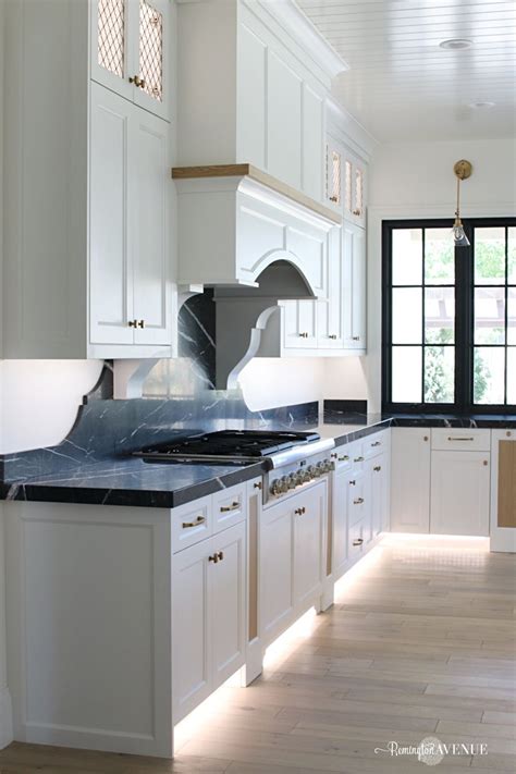 The french country style, reminiscent of the past, definitely evokes a sense a familiarity that i love. French Country Modern Kitchen with Black Marble Counters ...