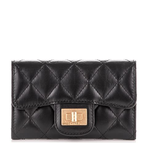Retail for $550 in us. CHANEL Aged Calfskin Quilted Reissue Flap Card Holder Black 178268