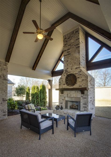 Chandeliers and pendants are perfect for these higher ceilings and exude. Regency Homebuilders: Outdoor Living Area, brick fireplace ...