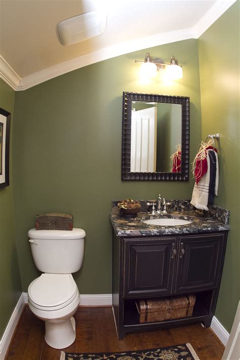 On the other hand, too many dark colours can make your lavatory appear smaller! Small half bath with slanted ceiling | Modern bathroom ...