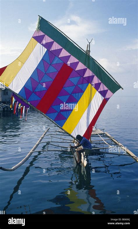 Sulu Sea Muslim Vinta Outrigger Boat Colourful Sail Two Men Zamboanga
