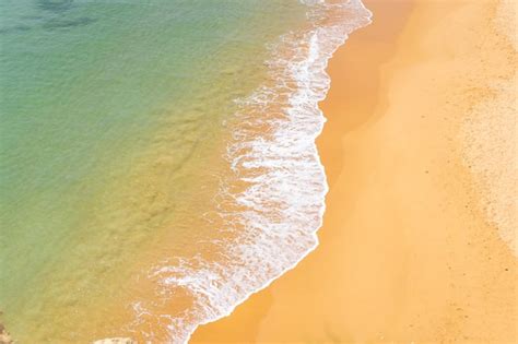 Premium Photo Aerial View Of Sea Waves And Sandy Beach