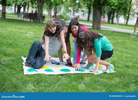 Students Play The Game Twister Stock Photo Image Of Friends Female