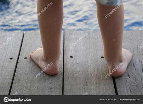 Barefoot Toddlers Feet Standing Wooden Floor Stock Photo By