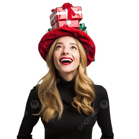 فتاة جميلة المظهر ترتدي قبعة عيد الميلاد وتبدو سعيدة تمامًا محاطة بالهدايا فتاة سانتا فتاة