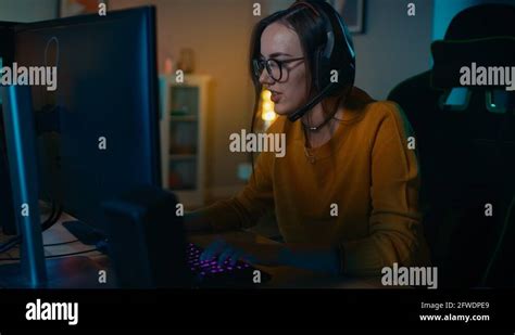 Excited Gamer Girl In Headset With A Mic Playing Online Video Game On Her Pc Stock Video Footage