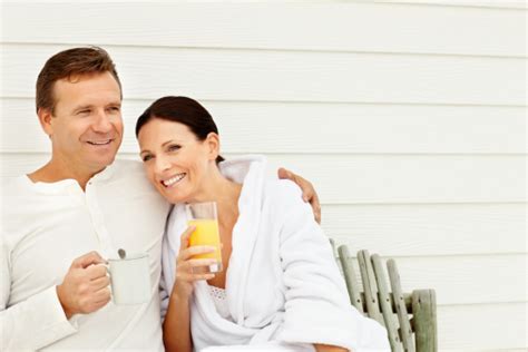 Happy Romantic Couple Enjoying Morning Refreshments Together Stock