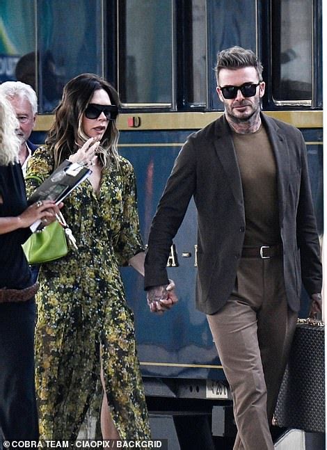 Victoria Beckham Puts On A Loved Up Display With Her Husband David As