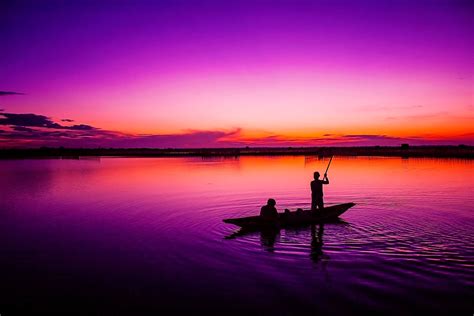 Fishing At Sunrise In A Lagoon In Hue Province Vietnam Sunset Beach