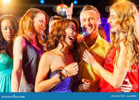 Party People Dancing In Disco Or Club Stock Photo Image Of