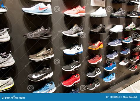 A Lot Of New Modern Shoes On The Wall Editorial Photo Image Of