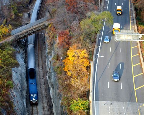 Amtrak Train And Henry Hudson Parkway Southbound Lanes Fort