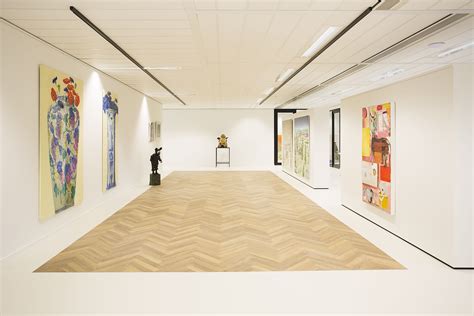 Entry Of Marketing Agency Zandbeek With Fishbone Floor In Art Gallery