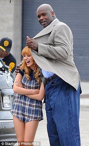 Bella Thorne Wears Playful Dungarees As She Larks Around With Shaquille Oneal While Shooting