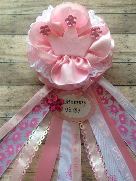 Having a baby is one of life's greatest adventures, so it makes a fabulous baby shower theme. Princess Theme Mommy to Be Baby Shower Corsage Pink Baby