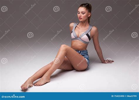 Girl With Legs Sitting Beautiful Woman In Denim Shorts And Underwear