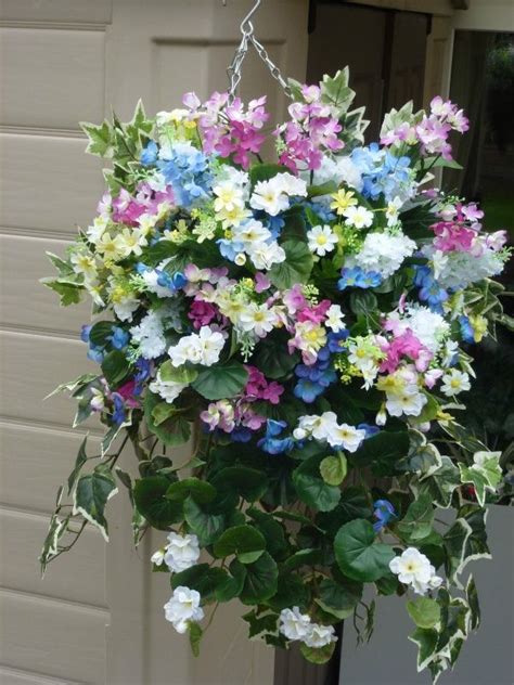 Eight repurposed bike wheel garden fence. 17 Best images about Artificial flower hanging baskets on ...