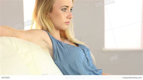 Beautiful Blonde Teen Relaxing On The Couch Stock Video Footage 4675005