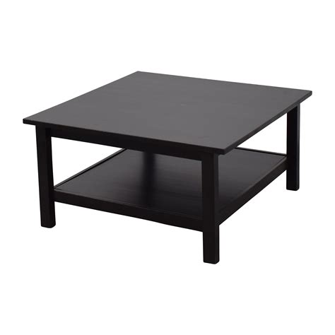 Has a sturdy, chromed steel base and wood top, and its contemporary style will enhance any living room furniture set. 66% OFF - IKEA IKEA Brown Square Coffee Table / Tables