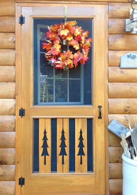 A wooden stove exemplifies rustic charm and a touch of brass grants elegance. Autumn is in the Air! | Wood screen door, Custom screen ...