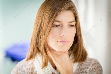 Woman Stroking Her Throat Stock Image C0346520 Science Photo Library