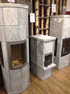 Scott amundson inspiration for a scandinavian medium tone wood floor dining room. Old Swedish soapstone wood stove. | Classic and modern ...